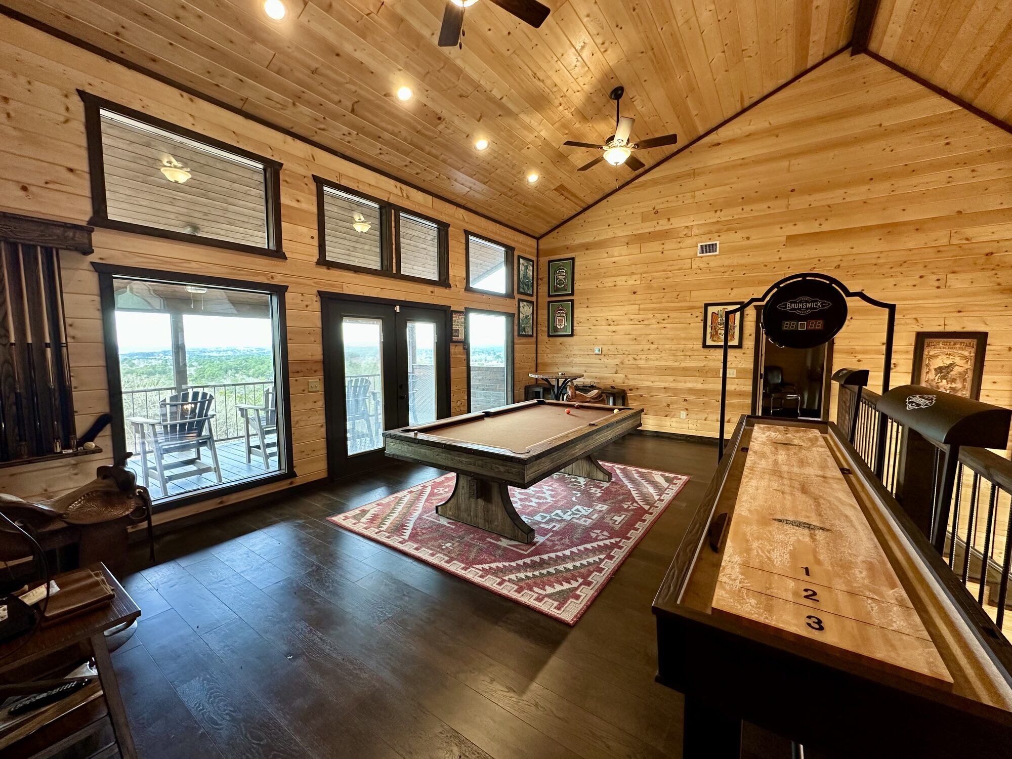 Game room opening to the deck — Mack Mountain Lodge