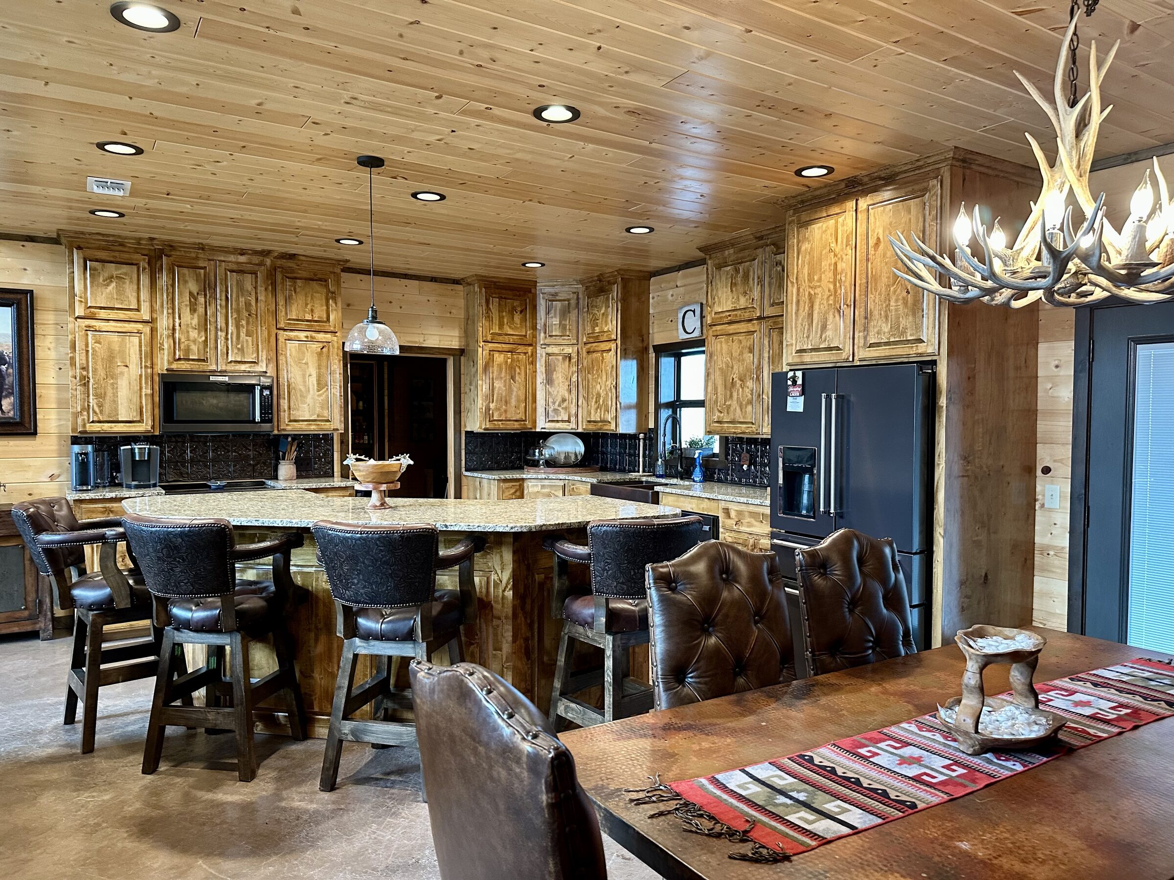 Knotty-alder kitchen with granite island